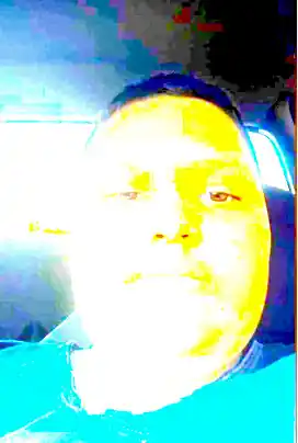 A lovely emotion of a yellow man with a beard and top hat